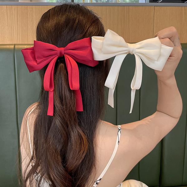 red and white bow for women